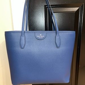 Brand new Kate Spade tote with tags. Comes from a pet free, smoke free home :)